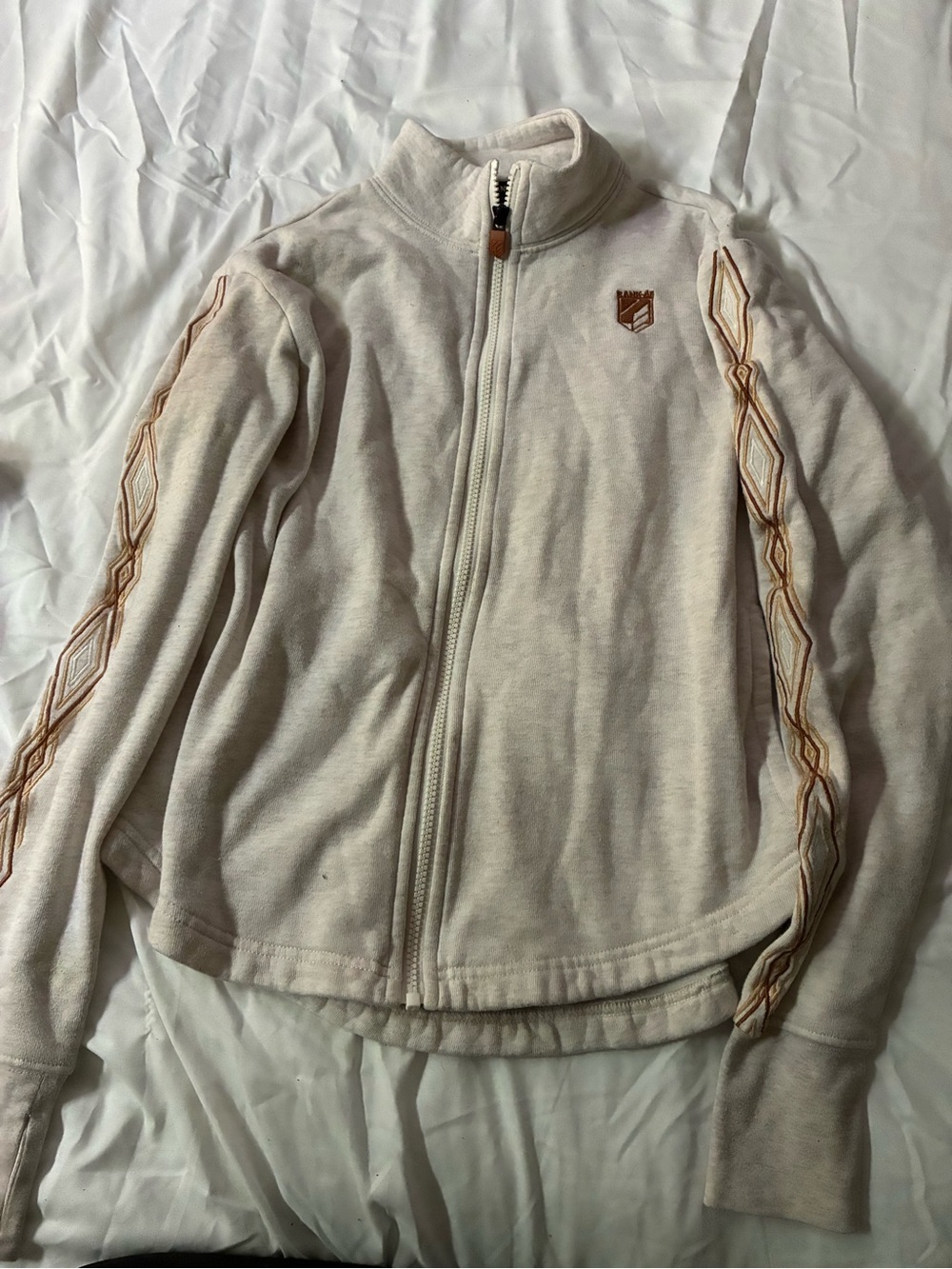 Women’s Cream Zip-Up Fleece Jacket with Embroidered Sleeve Detail